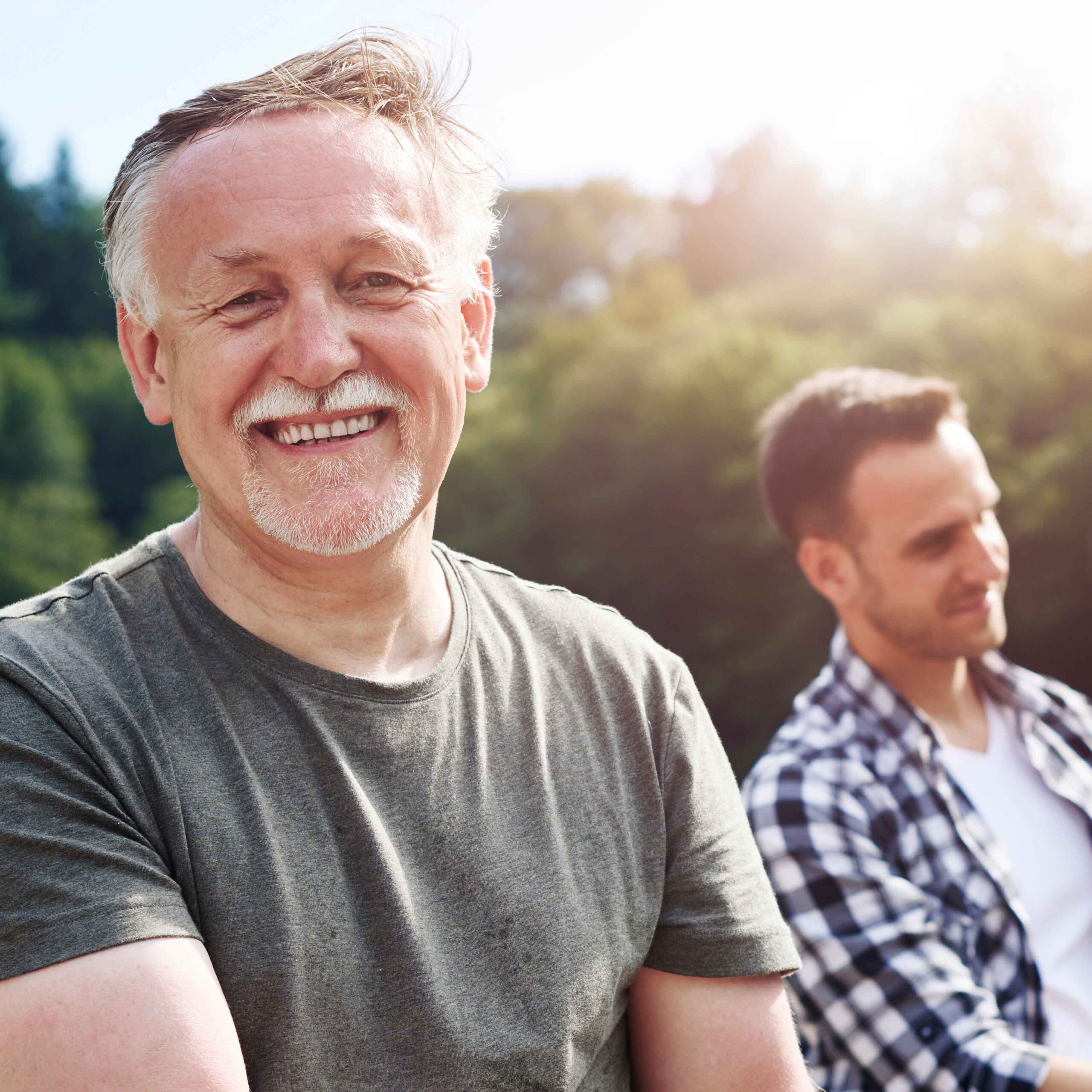 Portrait,Of,Cheerful,Senior,Man,Fishing